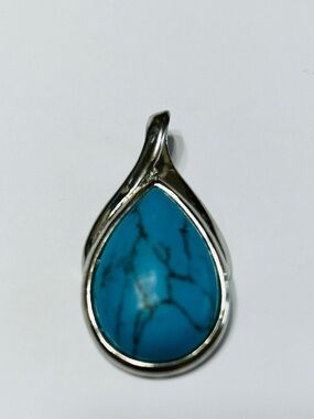 Liz Sophia silver tone & faux turquoise pendant.